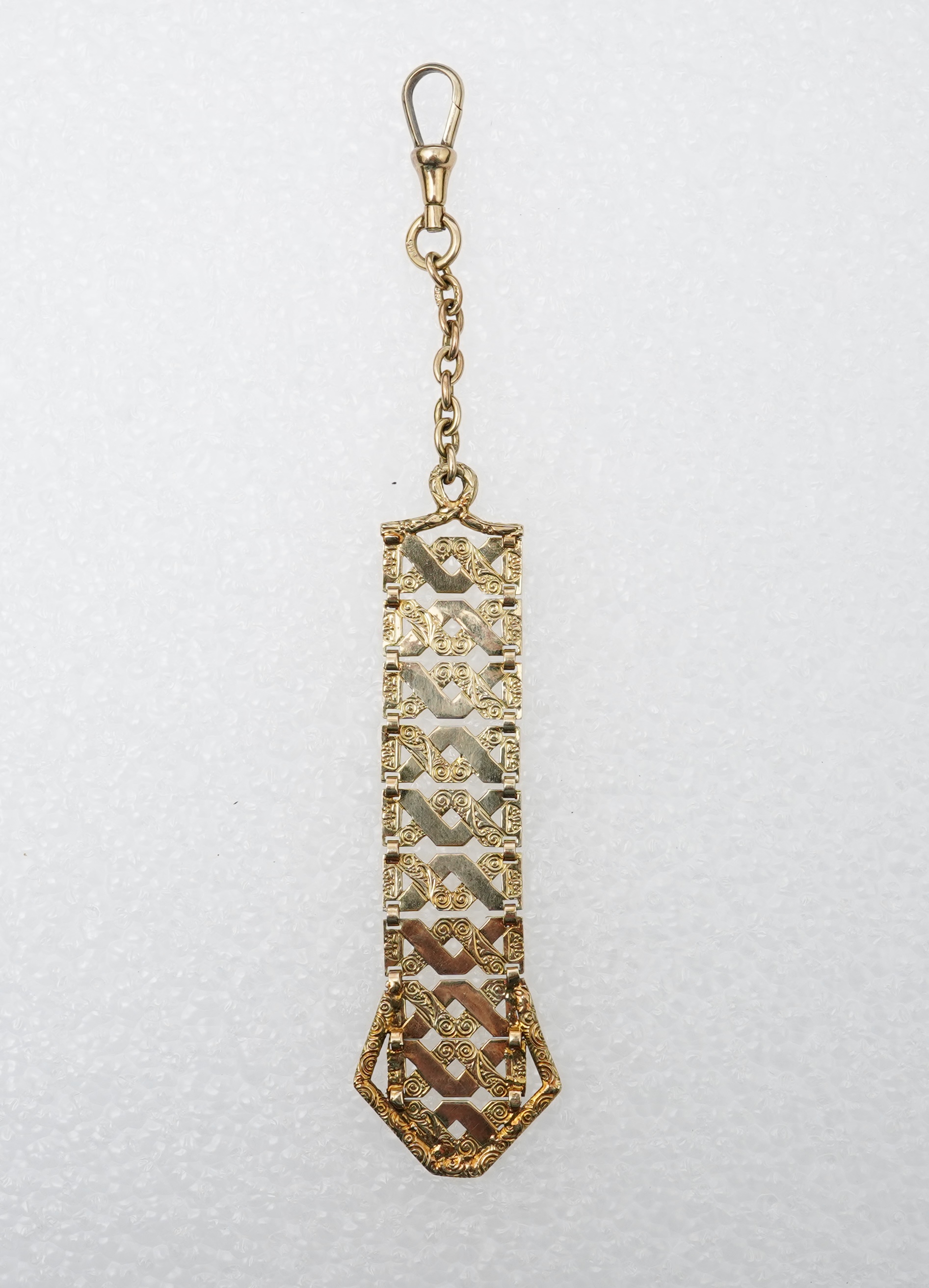 An unusual gold pendant, early 20th century